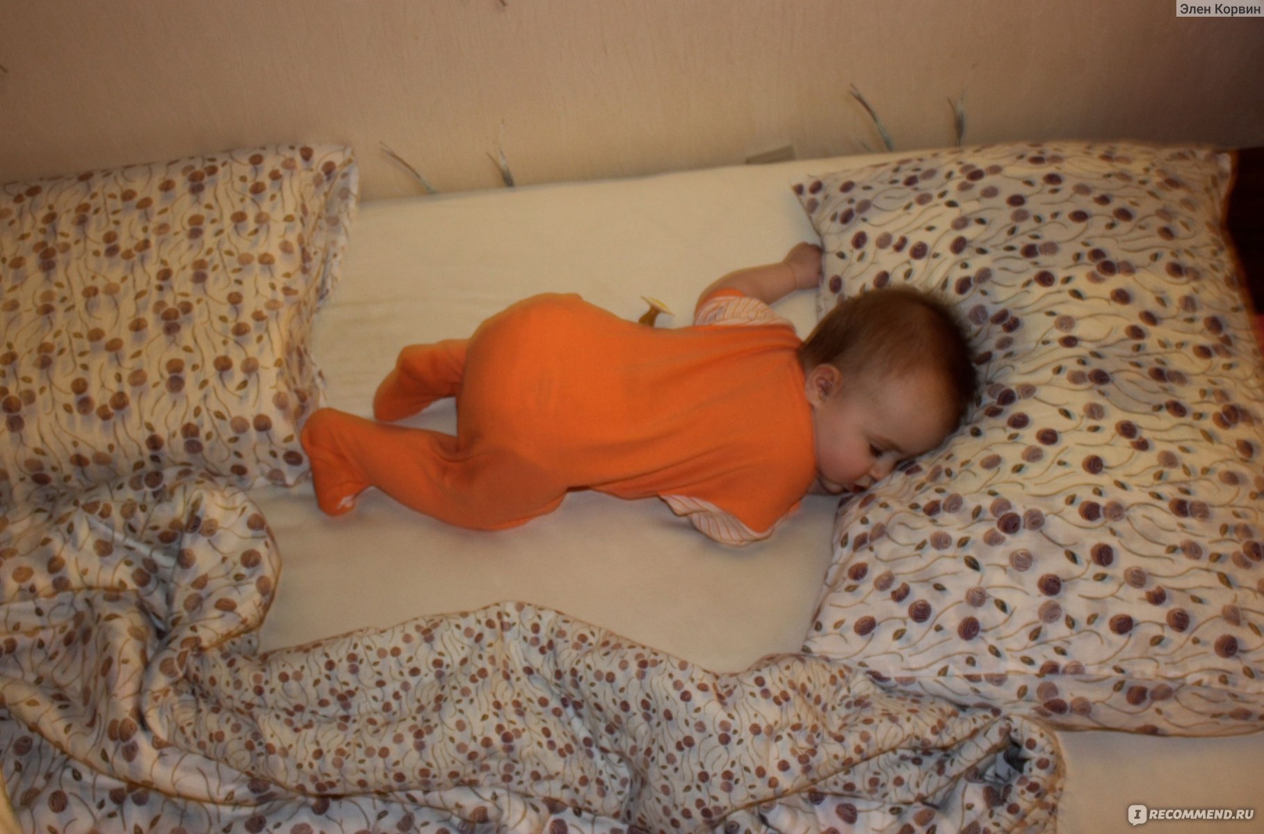 Как приучить младенца спать на другом боку