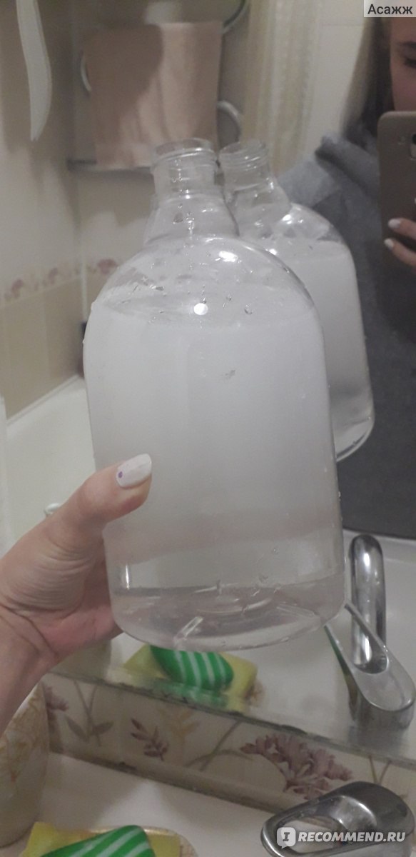Бутылка с теплой водой из под крана