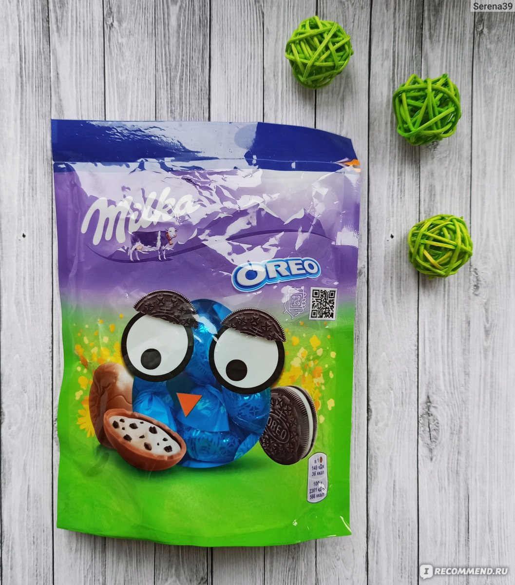 Фигурный молочный шоколад в форме яйца Milka с молочной начинкой с  кусочками печенья 