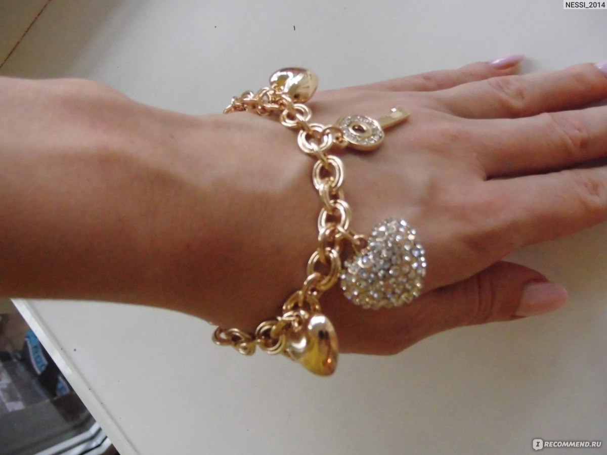 Золотой браслет с висюльками женский на руку