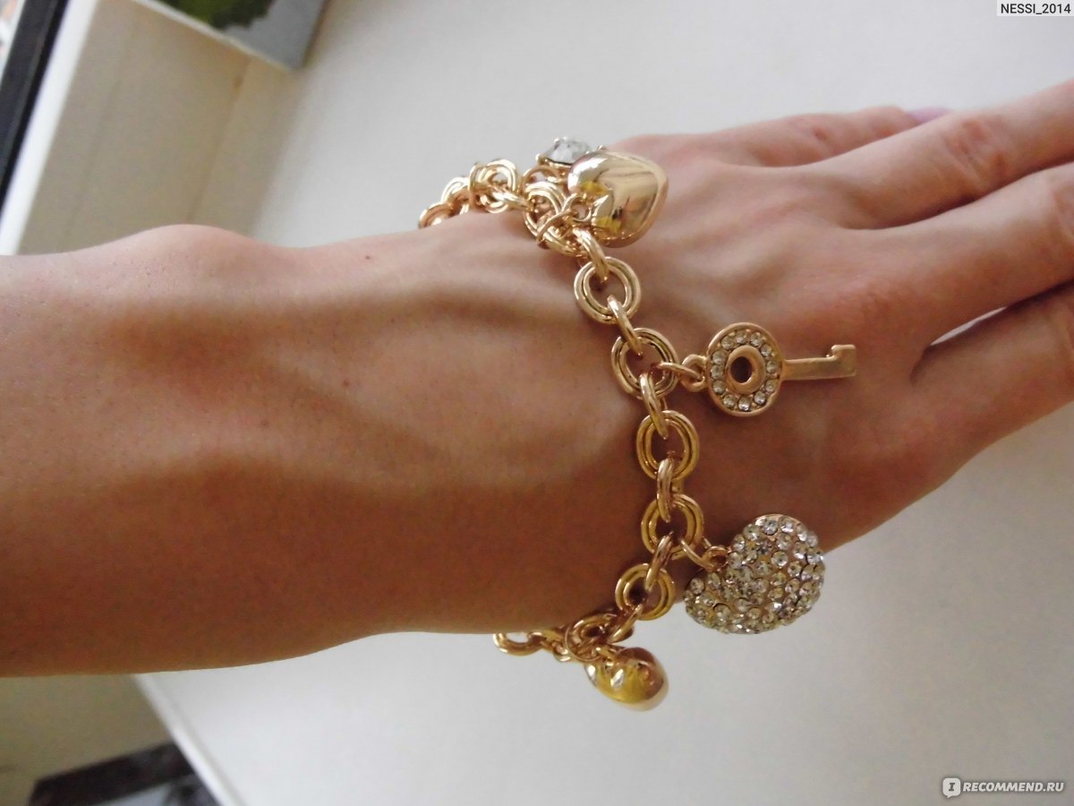 Золотой браслет с висюльками женский на руку