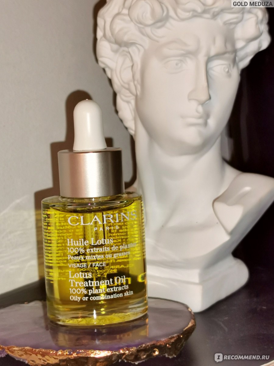 Масло косметическое Clarins Huile Lotus Face Treatment Oil для лица "Лотос" для комбинированной или жирной кожи фото