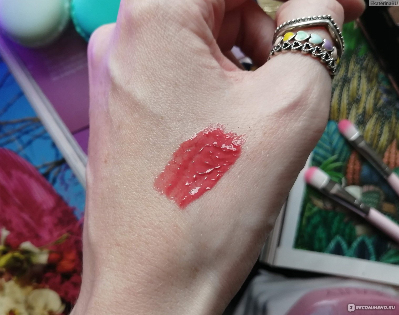 pure color envy kissable lip shine in rebellious rose