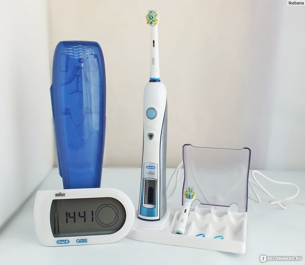 Электрическая зубная щетка Braun Oral-B Triumph 5000 фото