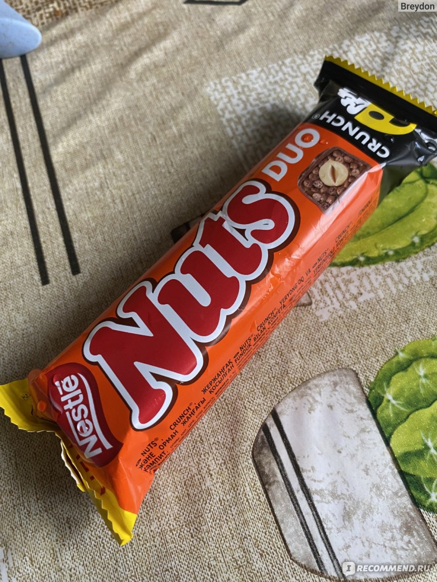 Шоколадный батончик Nestle Nuts Duo Crunch с фундуком и арахисом ...