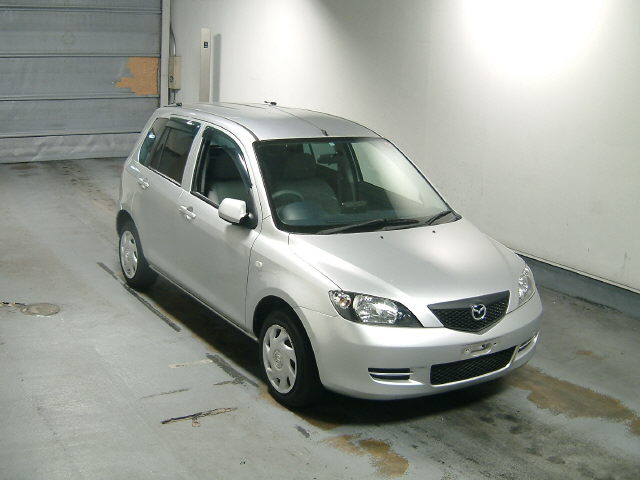Mazda demio - 2004 фото